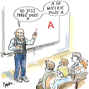 Wykładowca pokazuje 2 litery A i tłumaczy: To jest małe duże A, a to jest wielkie duże A.